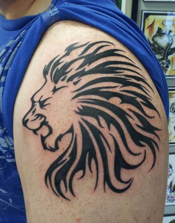 Bewitching savage lion head tribal tattoo designs on shoulder for Men