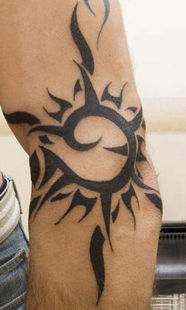 Cool trendy sun tattoo designs on arm for guys