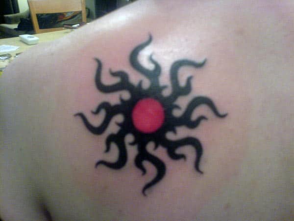 Back shoulder Red black tribal sun tattoo ideas for Men