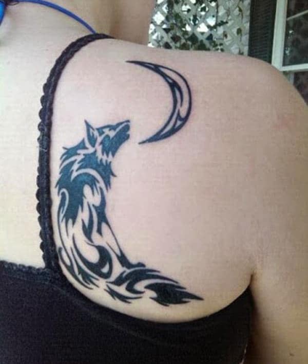 Captivating Moon and howling wolf tribal tattoo ideas for women on back shoulder