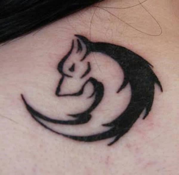 Cool tribal wolf tattoo on the back shoulder tattoo ideas for girls and women