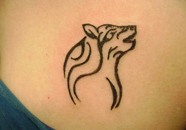 Simple pleasing wolf face Celtic tattoo ideas on side for Girls and women