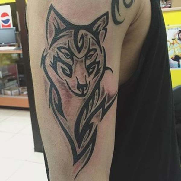 Men’s Fantastic tribal wolf head tattoo designs on arm