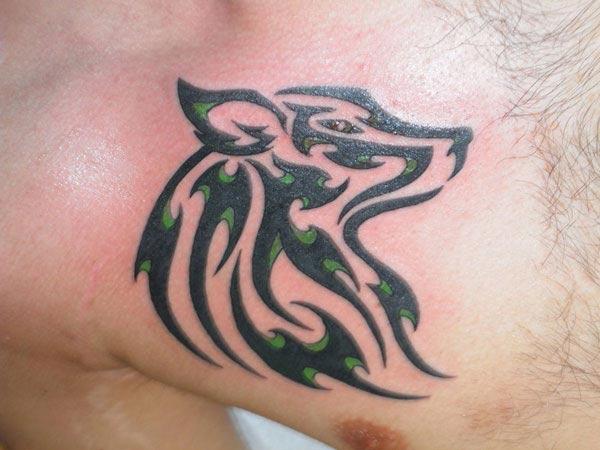 Attractive green black celtic wolf head tattoo ideas on chest for boys and men