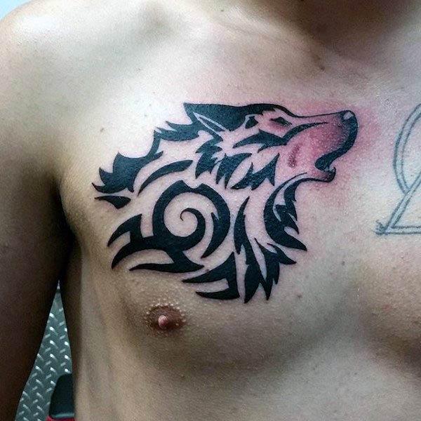 Interesting Celtic tribal howling wolf head tattoo design on chest for boys