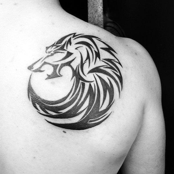 Charming tribal wolf circle tattoo ideas on back shoulder for Guys