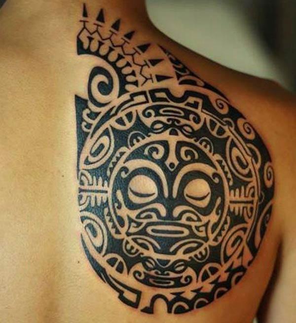 Men’s Enthralling Aztec tribal back tattoo