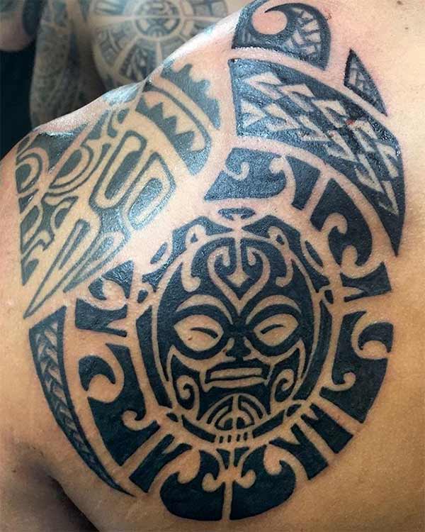 Intense black finish Aztec tribal back shoulder tattoo design for Guys