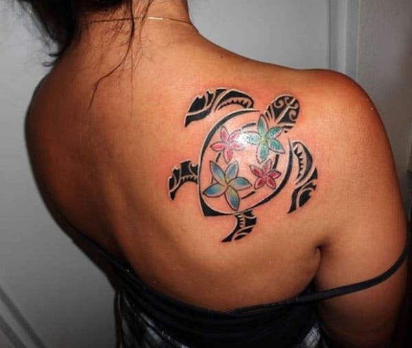 Attractive Hawaiian tribal turtle with vibrant orchids tattoo designs on back for Girls