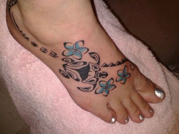 Charming Hawaiian tribal turtle with blue orchids tattoo designs on feet for Ladies