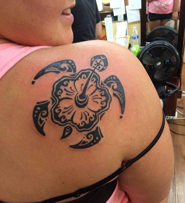 Artistic hibiscus shaped turtle Hawaiian tribal tattoo ideas on back shoulder for Women