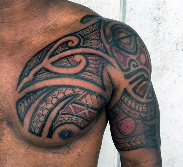 Brilliantly artistic red black Hawaiian tribal chest and arm tattoo ideas for Men