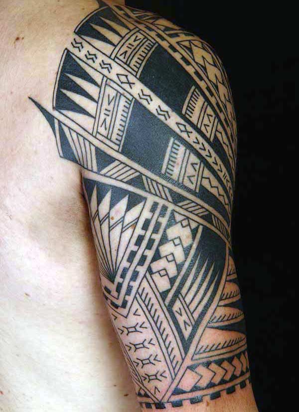 Intense black lined Hawaiian tribal tattoo on shoulder for Guys