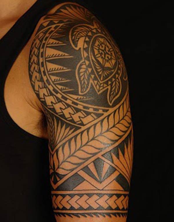 Beautiful aesthetic looking Turtle centered Hawaiian Tribal Tattoo on shoulder for Guys