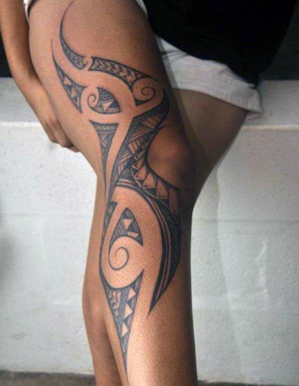 Interesting broad black Hawaiian Tribal Tattoo design on leg for Ladies