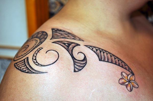 Simple enchanting Hawaiian Tribal Tattoo with orchid on shoulder for Girls
