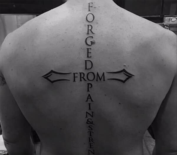 Amazing cross with wording tattoo ideas for boys and men on back