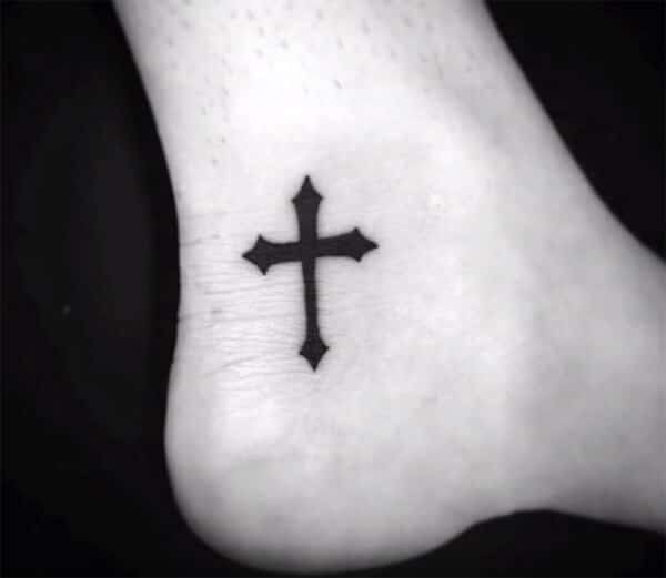 Marvelous catchy intense black cross tattoo ideas on ankle for guys