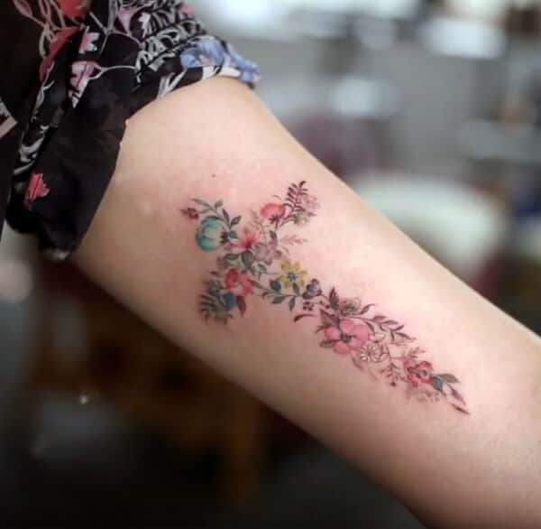 Beautiful astonishing floral cross tattoo ideas on arm for girls