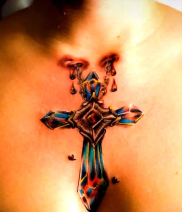 Jaw-dropping stunning 3D cross tattoo ideas on chest for Women