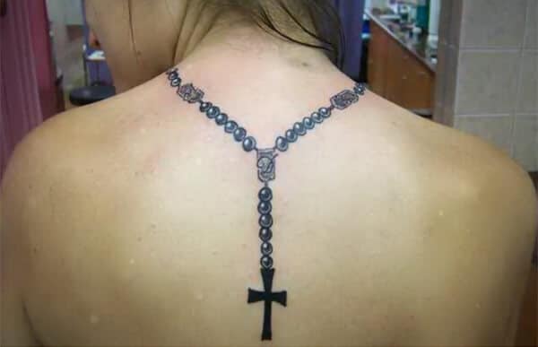 Creative, stunning cross rosary tattoo ideas on back for girls and women