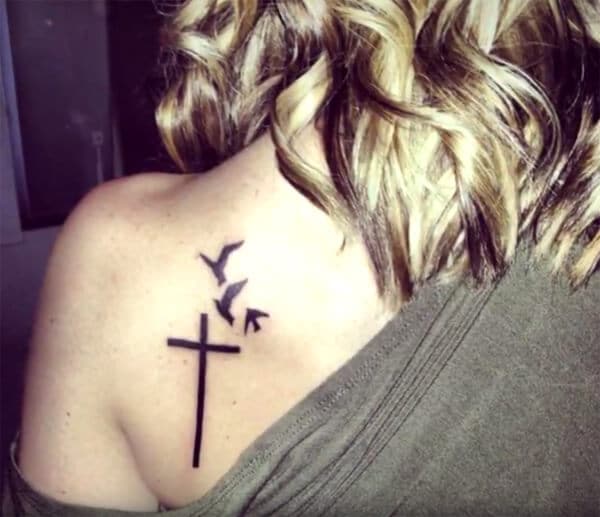 Pretty cross with birds tattoo ideas on back for Girls and ladies