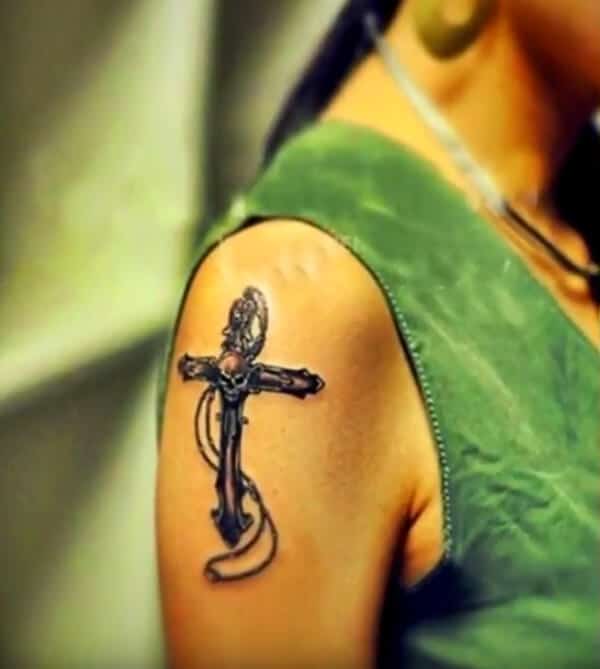 Striking cool cross with skull tattoo ideas on shoulder for Women