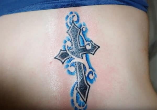 Divine looking blue and black cross tattoo design ideas on back for Ladies