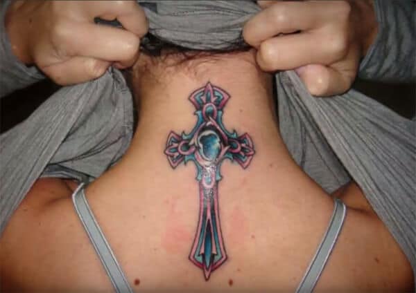 Decorative mesmerizing pink blue cross design tattoo ideas on back neck for women