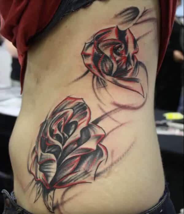 Awesome red and black rose sketch tattoo ideas on side rib for women