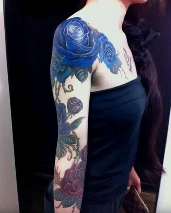 Stunning blue and red rose tattoo ideas on full sleeve for Ladies