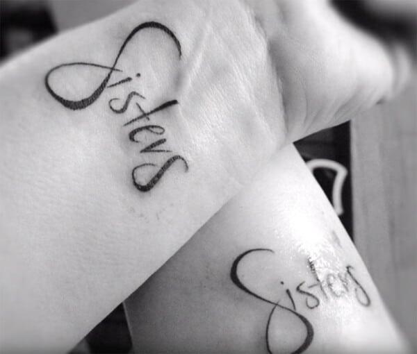 Sisters word stylish tattoo designs on wrist for ladies