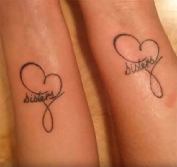 Simple yet elegant sisters word tattoo ideas on wrist for women and girls