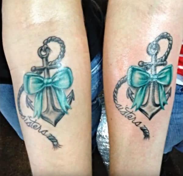 Jaw-dropping cool sisters word tattoo with anchor and bow ideas on forearm for Women and girls
