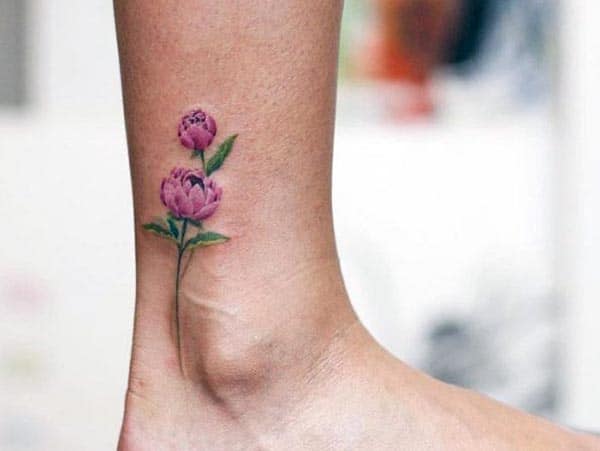 blooming floral ankle tattoo ideas for ladies who love flowers