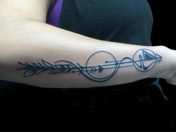 interesting arrow tattoo design on forearm for girls and ladies