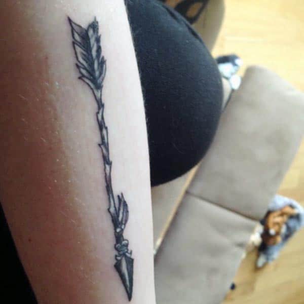 striking arrow tattoo ideas on arm for Girls and women