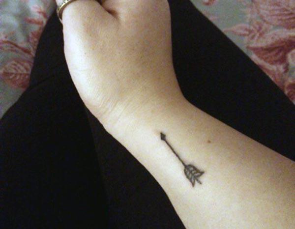 Cute line arrow tattoo ideas for Women on wrist