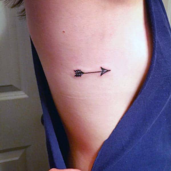 cool small solid arrow tattoo ideas for girls and women 