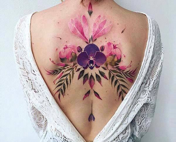 vividly colourful back tattoo design for girls and ladies