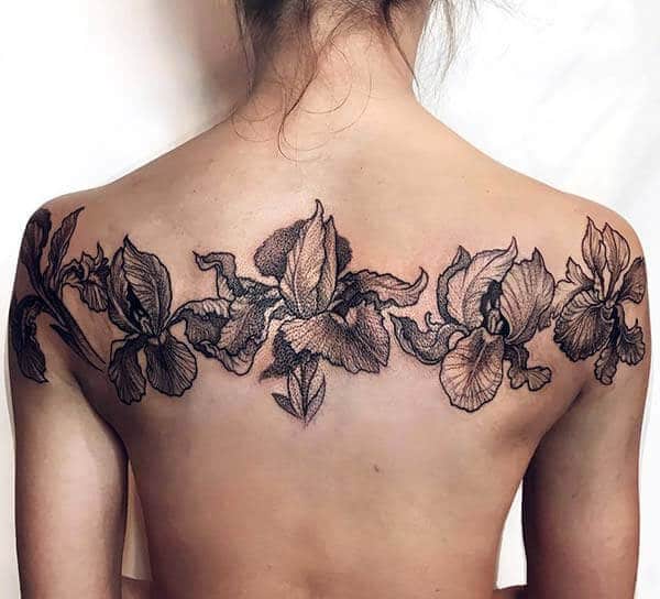 artistic floral tattoo design on back for girls and women
