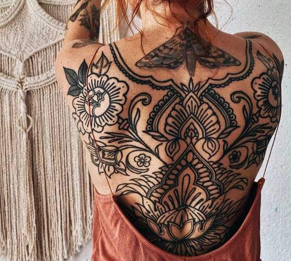 prepossessing back tattoo of intricate designs for girls