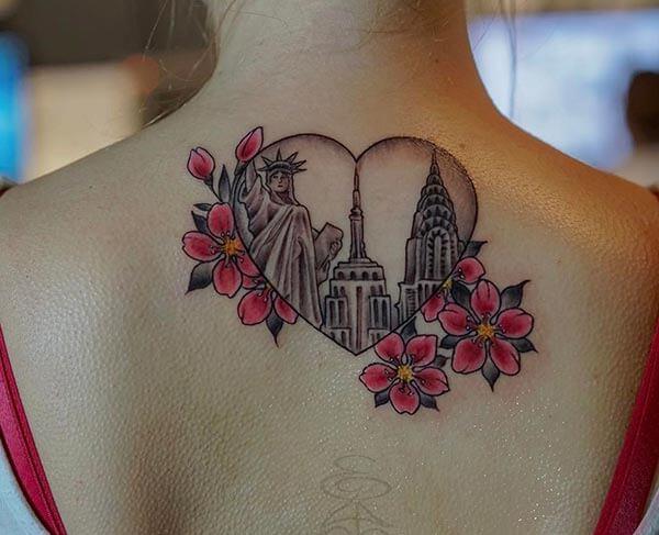 good-looking adorable tattoo design on back for girls and women