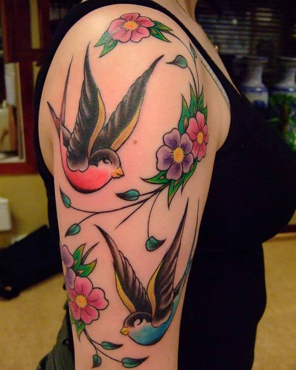 enchanting bird tattoo design on arm for girls and women