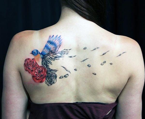 stunning and eye-catchy bird tattoo design on back for girls