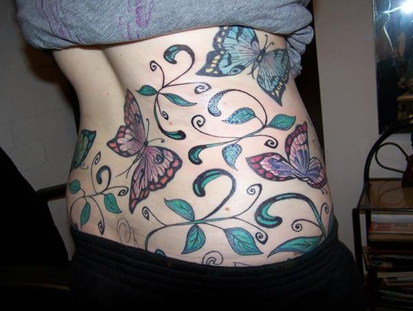 Flamboyant butterflies tattoo design on side belly for girls and ladies