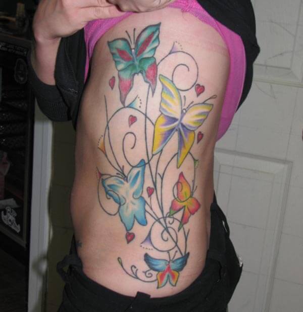 Stunning colourful butterfly tattoo designs on side belly for Girls 