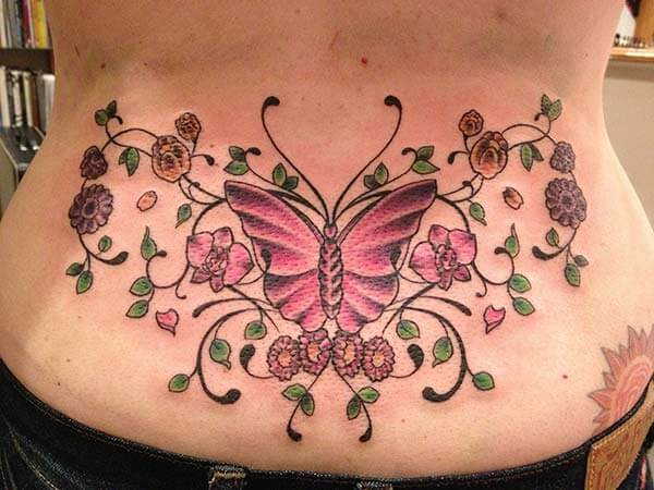 charming butterfly tattoo design on the lower back for Girls