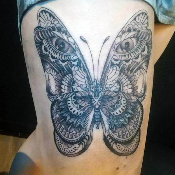 majestic and hyperrealistic butterfly tattoo design on thigh for Girls and women