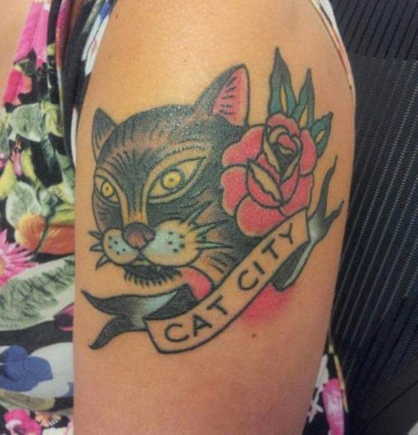 Cute cat tattoo ideas for girls on forearm